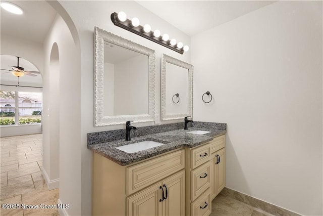 bathroom with vanity and ceiling fan