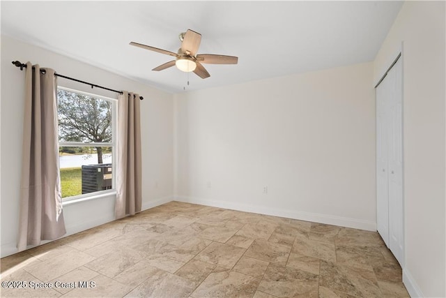 unfurnished room featuring ceiling fan