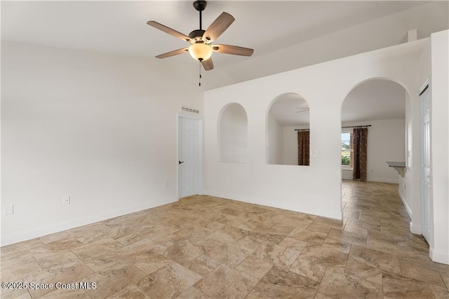 unfurnished room featuring ceiling fan