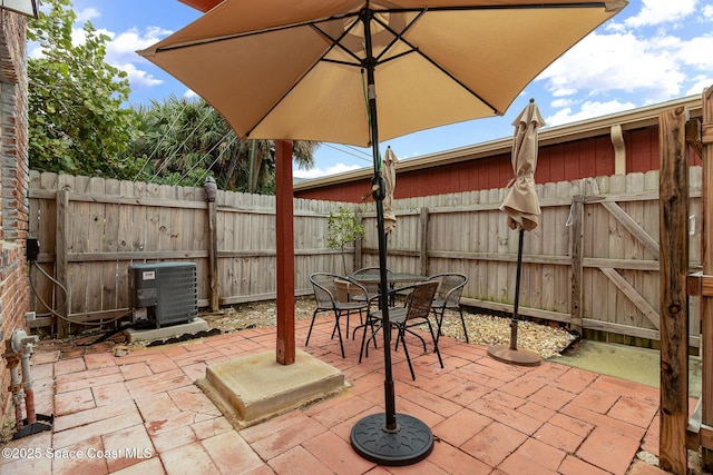 view of patio with central AC