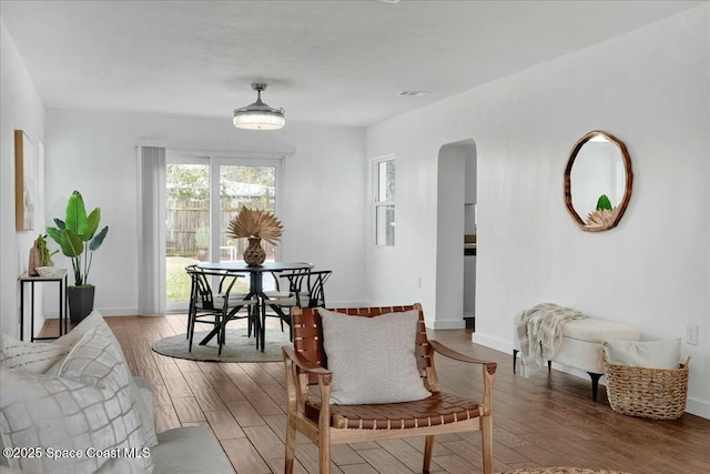 dining area featuring hardwood / wood-style floors