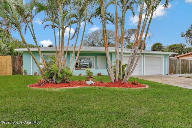 ranch-style house with a garage and a front yard