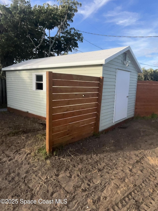 garage featuring fence