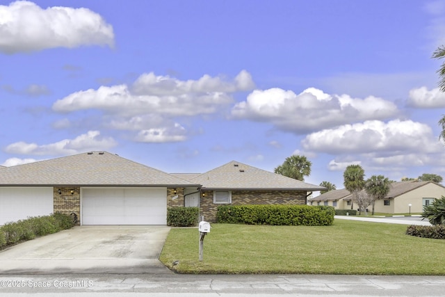 single story home with a garage and a front yard