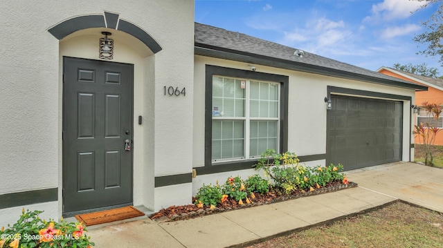 entrance to property with a garage