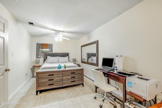 tiled bedroom with ceiling fan