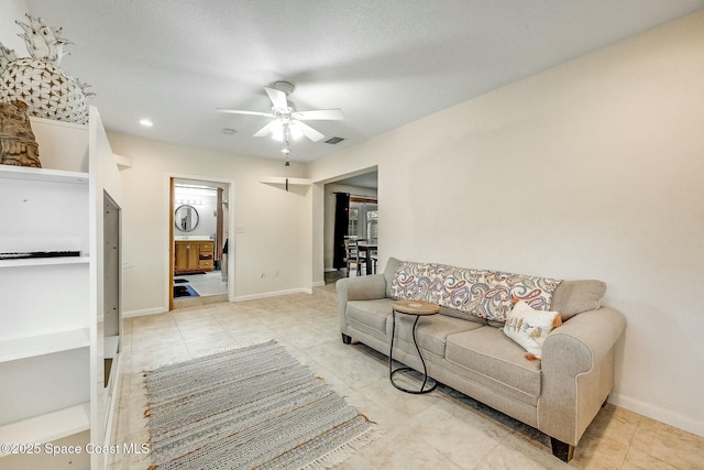 living room with ceiling fan