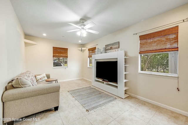 living room with ceiling fan