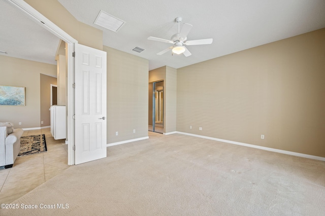 interior space with ceiling fan