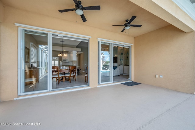 view of patio with ceiling fan