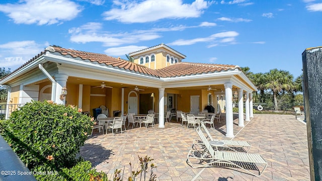 view of patio / terrace featuring ceiling fan