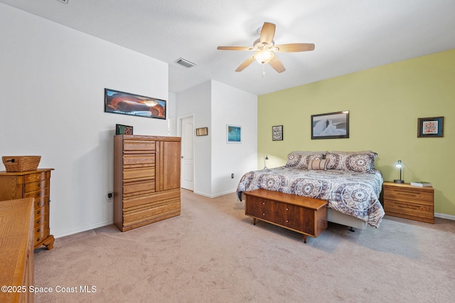 bedroom with light carpet and ceiling fan