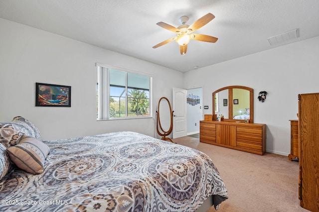 bedroom featuring ceiling fan and carpet flooring