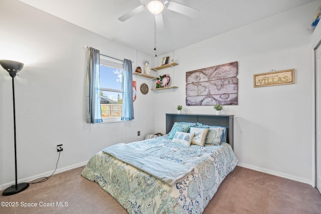 bedroom featuring light colored carpet and ceiling fan