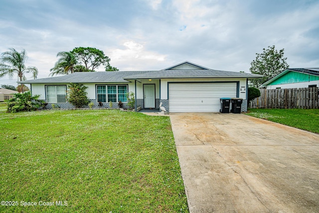 ranch-style house featuring a garage and a front lawn