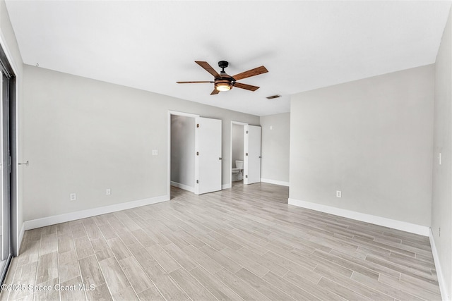 interior space with light hardwood / wood-style flooring and ceiling fan