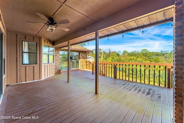 wooden terrace with ceiling fan