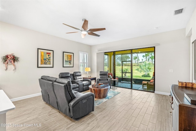 living room featuring ceiling fan