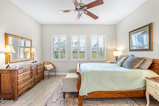 bedroom featuring ceiling fan and light wood-type flooring