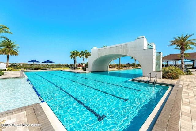 view of pool featuring a water slide