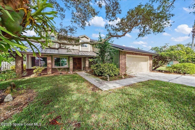 view of front of property featuring a garage and a front lawn