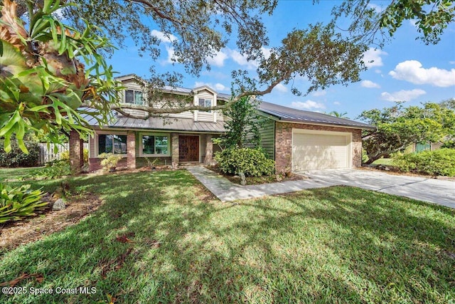 view of front of house with a garage and a front yard