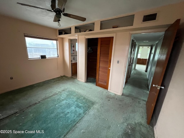 unfurnished bedroom featuring a closet and ceiling fan