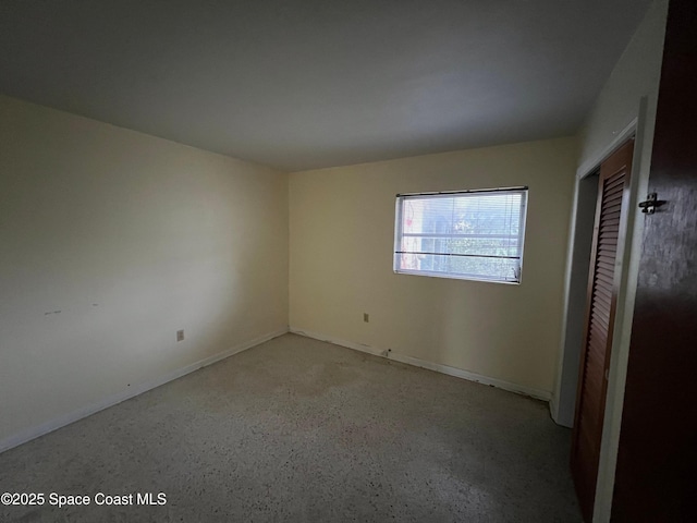 unfurnished bedroom featuring a closet