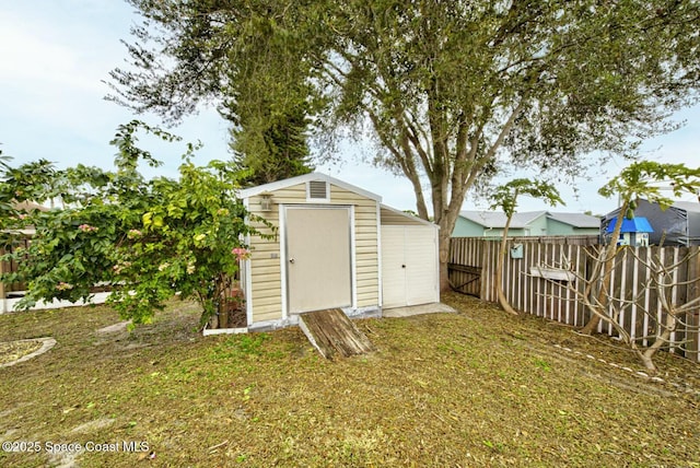 view of outbuilding featuring a yard