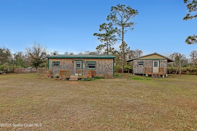 exterior space featuring a front lawn