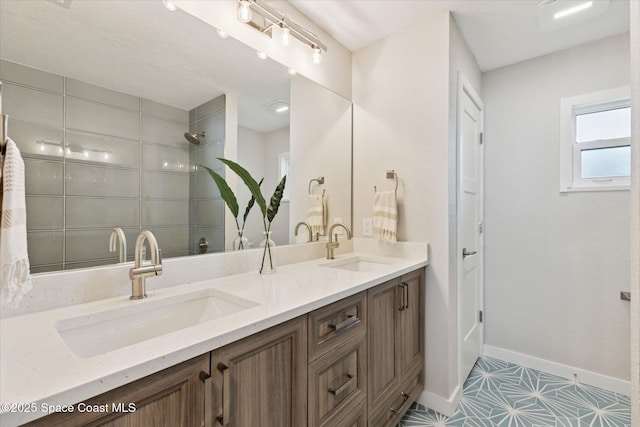 bathroom featuring vanity and tile patterned flooring