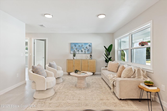 living room with concrete floors