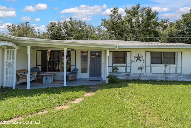 view of front of home with a front yard