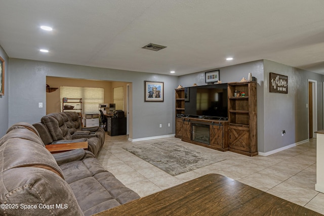 living room featuring light tile patterned flooring