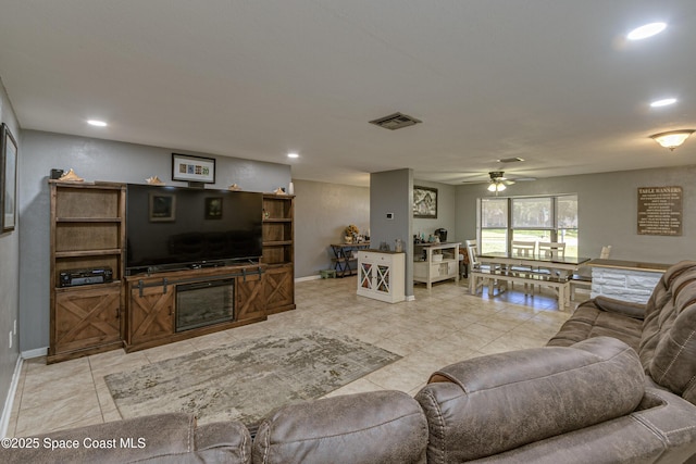 living room with ceiling fan