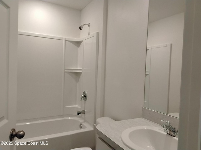 full bathroom featuring shower / tub combination, vanity, and toilet