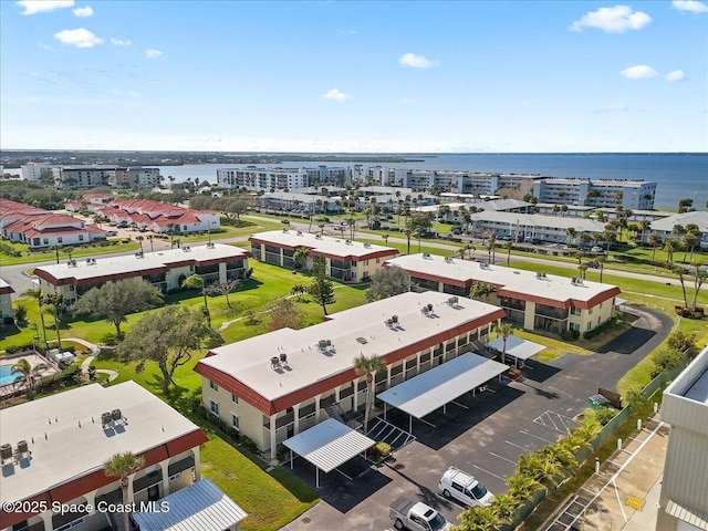 drone / aerial view with a water view