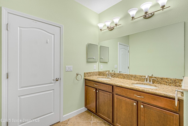 bathroom featuring vanity and tile patterned floors