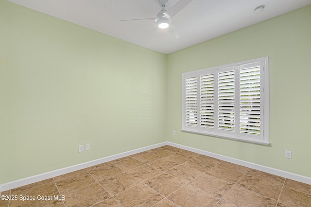 empty room featuring ceiling fan