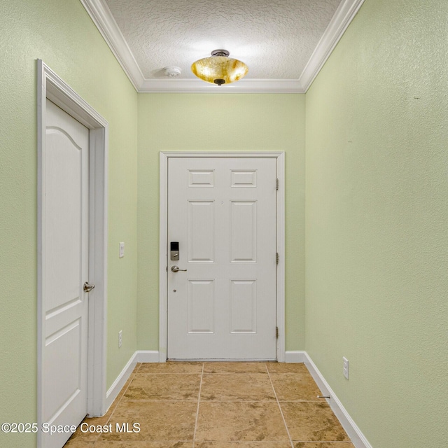 entryway with crown molding and a textured ceiling