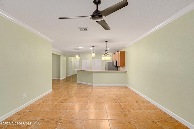 interior space featuring crown molding, light tile patterned floors, a textured ceiling, and ceiling fan