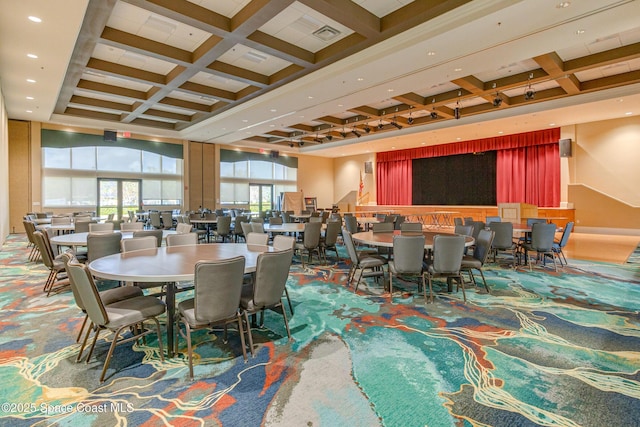 dining room with coffered ceiling, carpet floors, and beamed ceiling