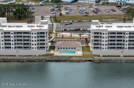 birds eye view of property featuring a water view