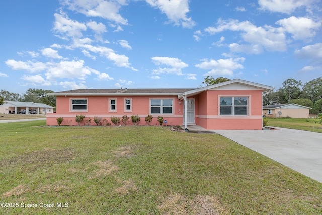 single story home featuring a front yard