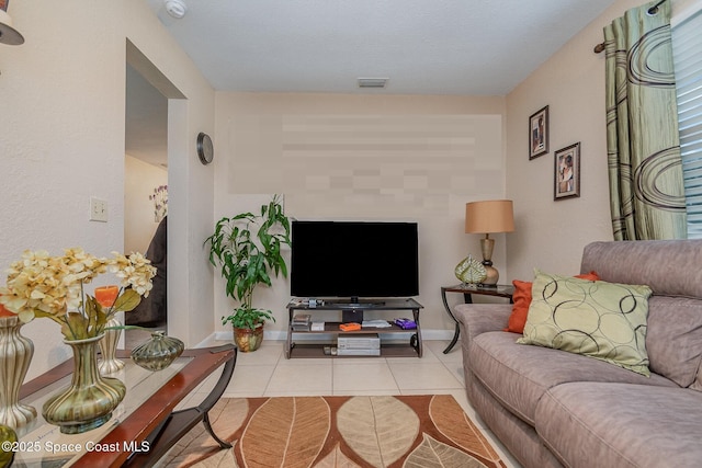 living room with light tile patterned floors