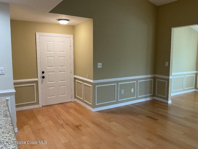 foyer with light hardwood / wood-style floors