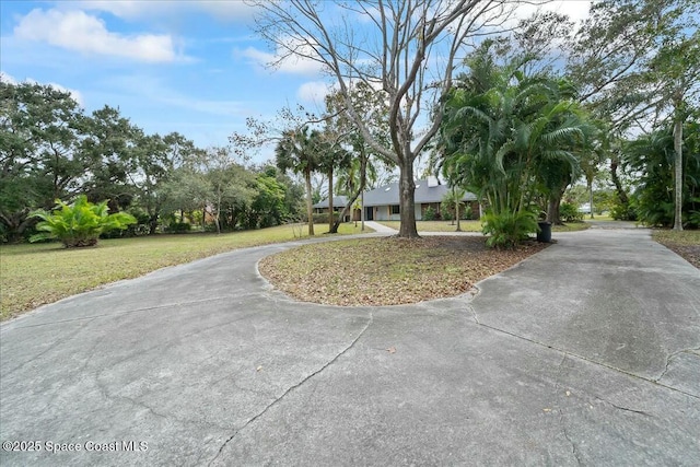 exterior space featuring a front lawn