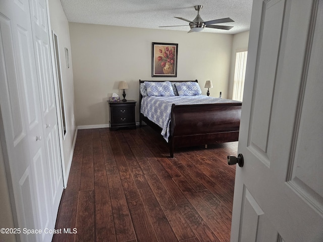 813 Pine Shadows Ave, Rockledge, FL 32955 - bedroom with ceiling fan, dark wood-style floors, and a textured ceiling