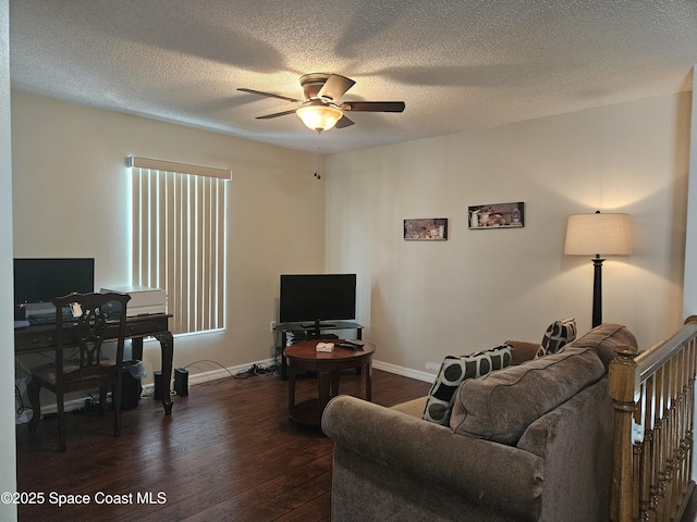 813 Pine Shadows Ave, Rockledge, FL 32955 - living room with baseboards, a textured ceiling, dark wood-style flooring, and ceiling fan