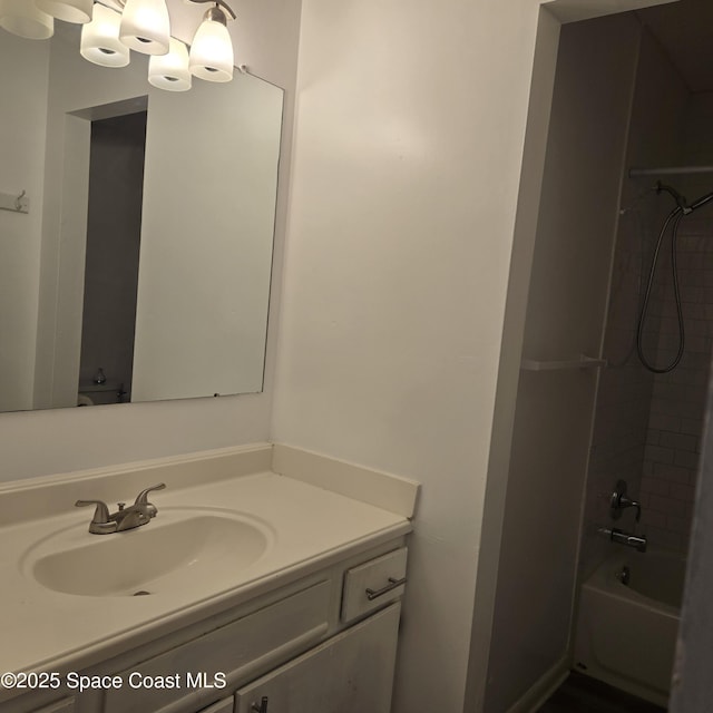 bathroom featuring vanity and shower / bath combination